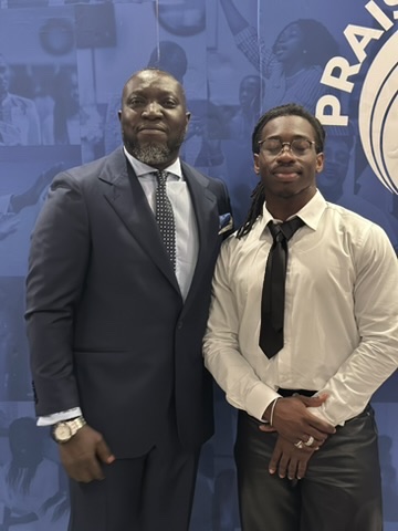 Franklin standing next to a family member at an event